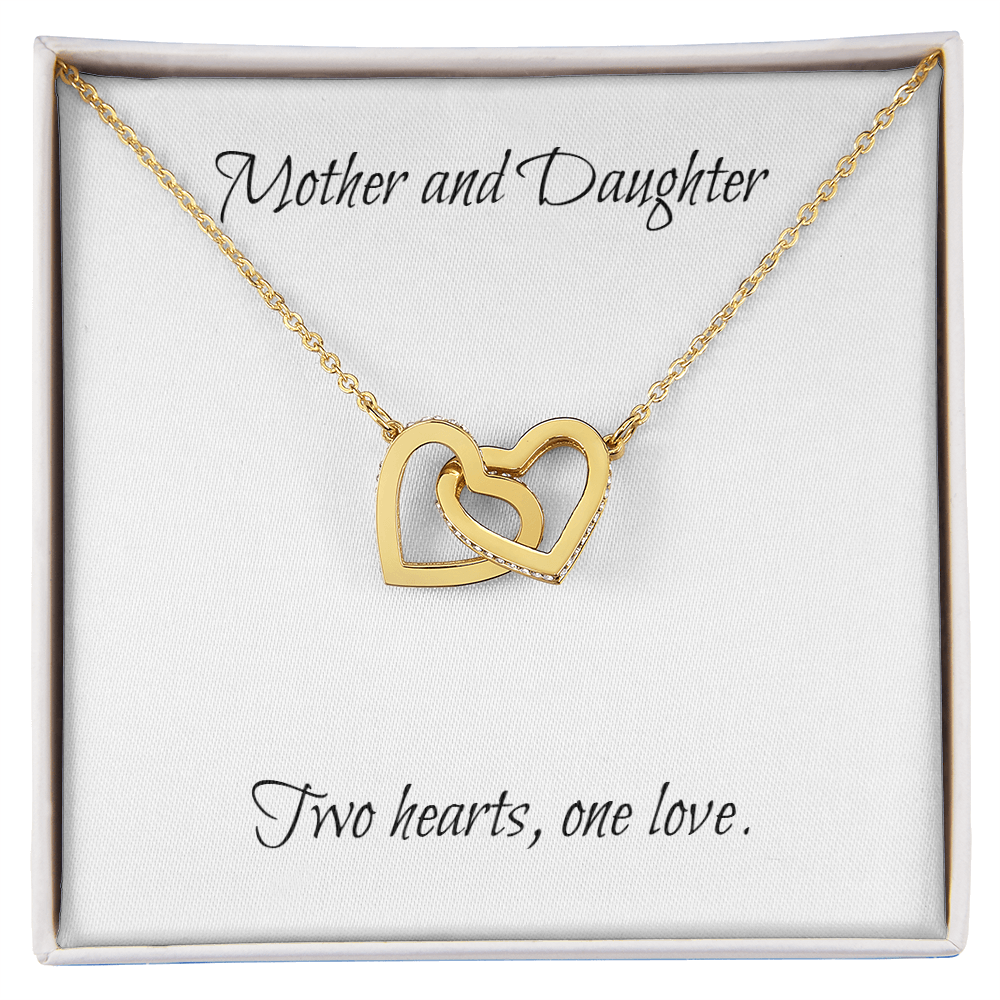 Mother and Daughter connecting hearts necklace.