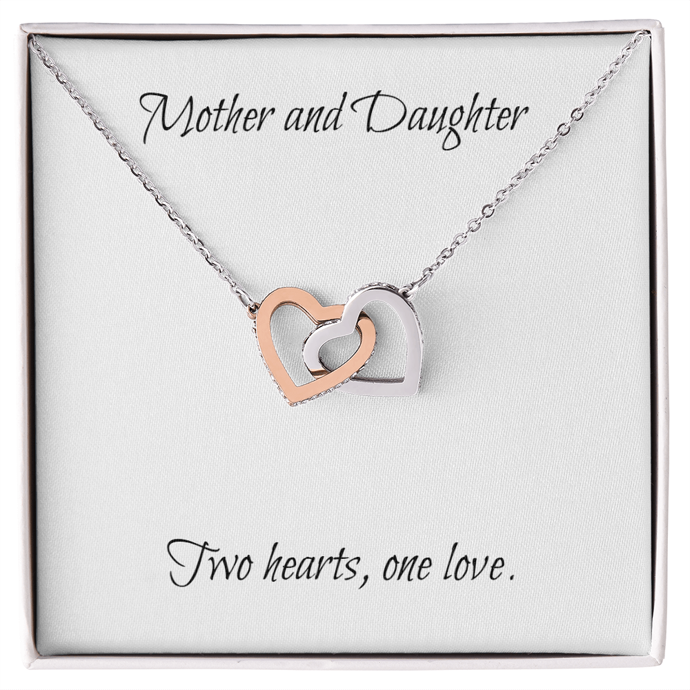 Mother and Daughter connecting hearts necklace.