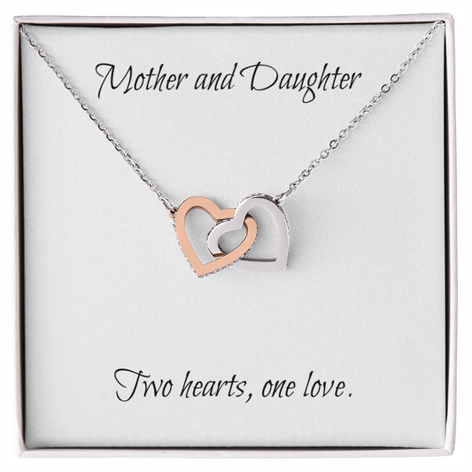 Mother and Daughter connecting hearts necklace.