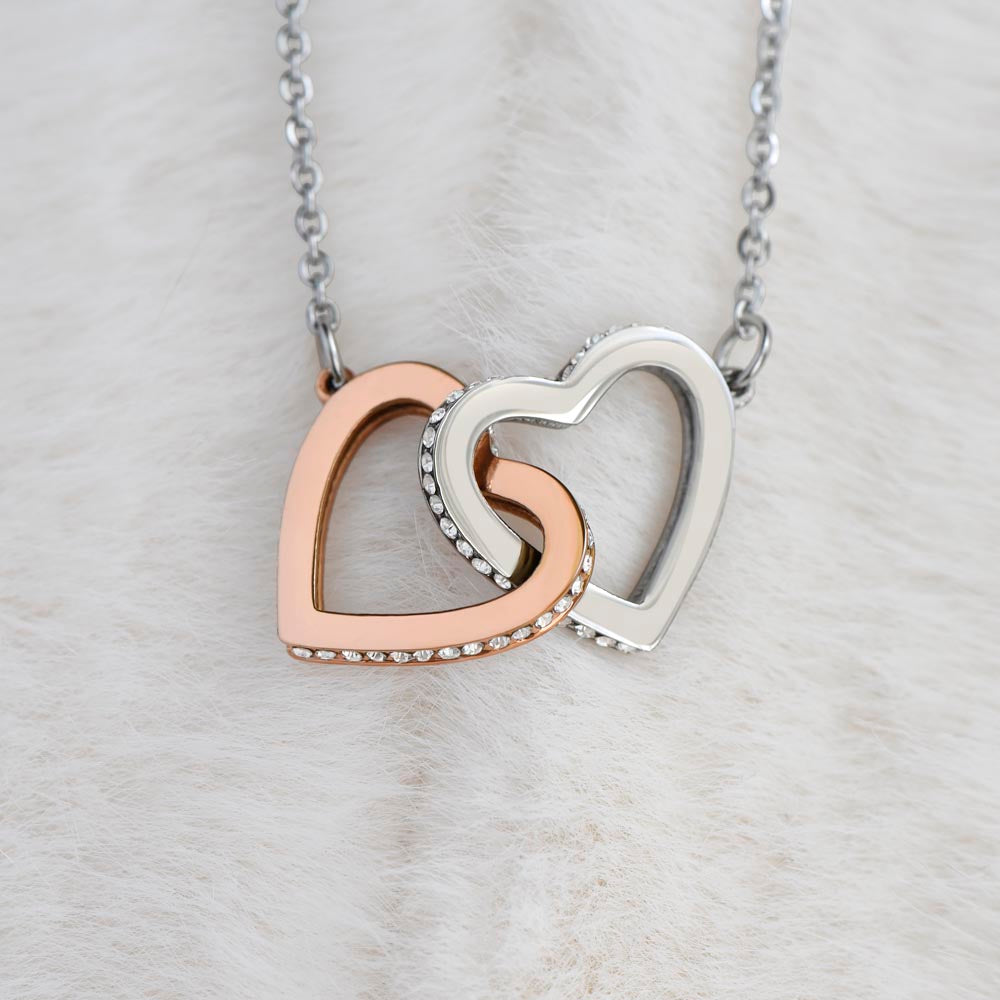 Mother and Daughter connecting hearts necklace.