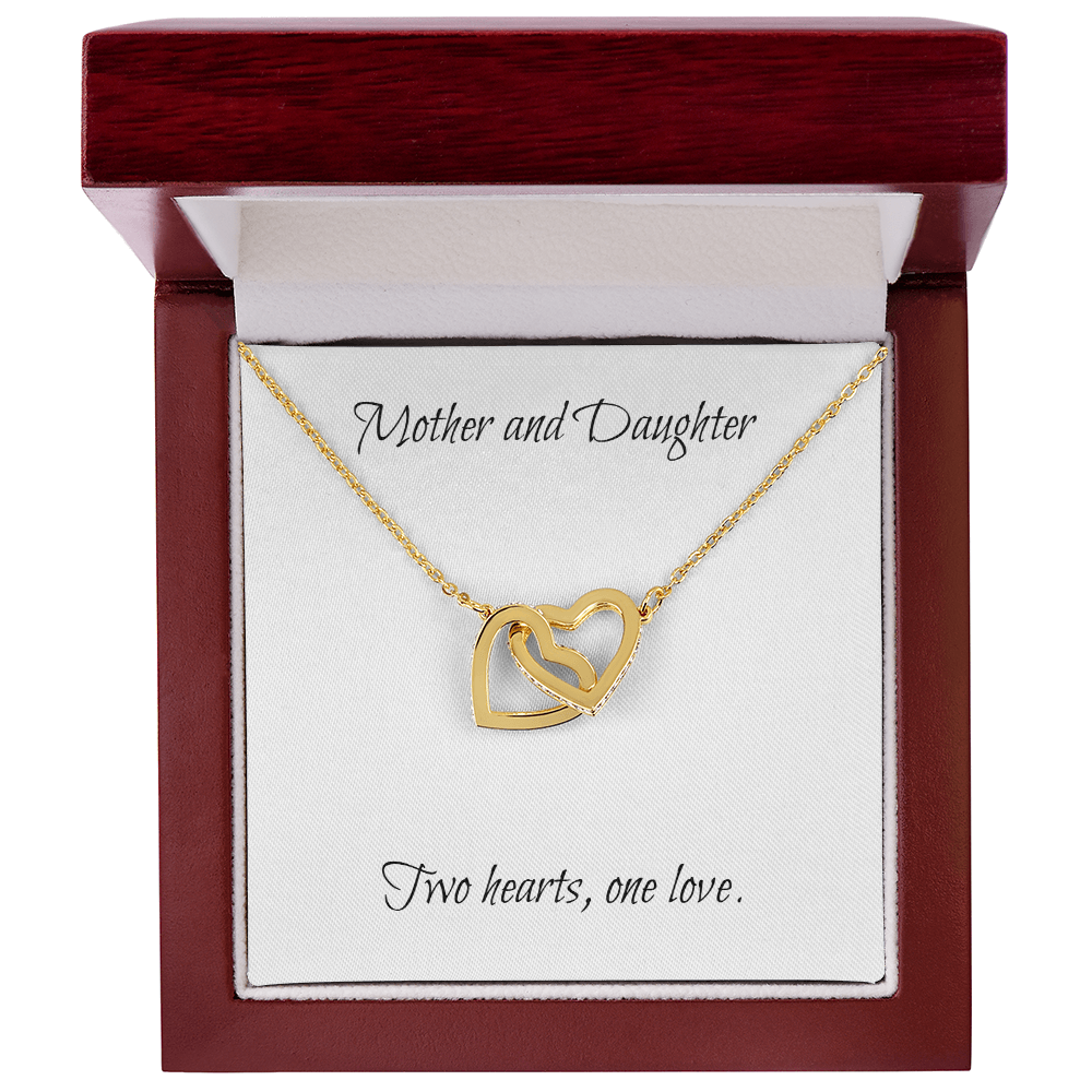 Mother and Daughter connecting hearts necklace.