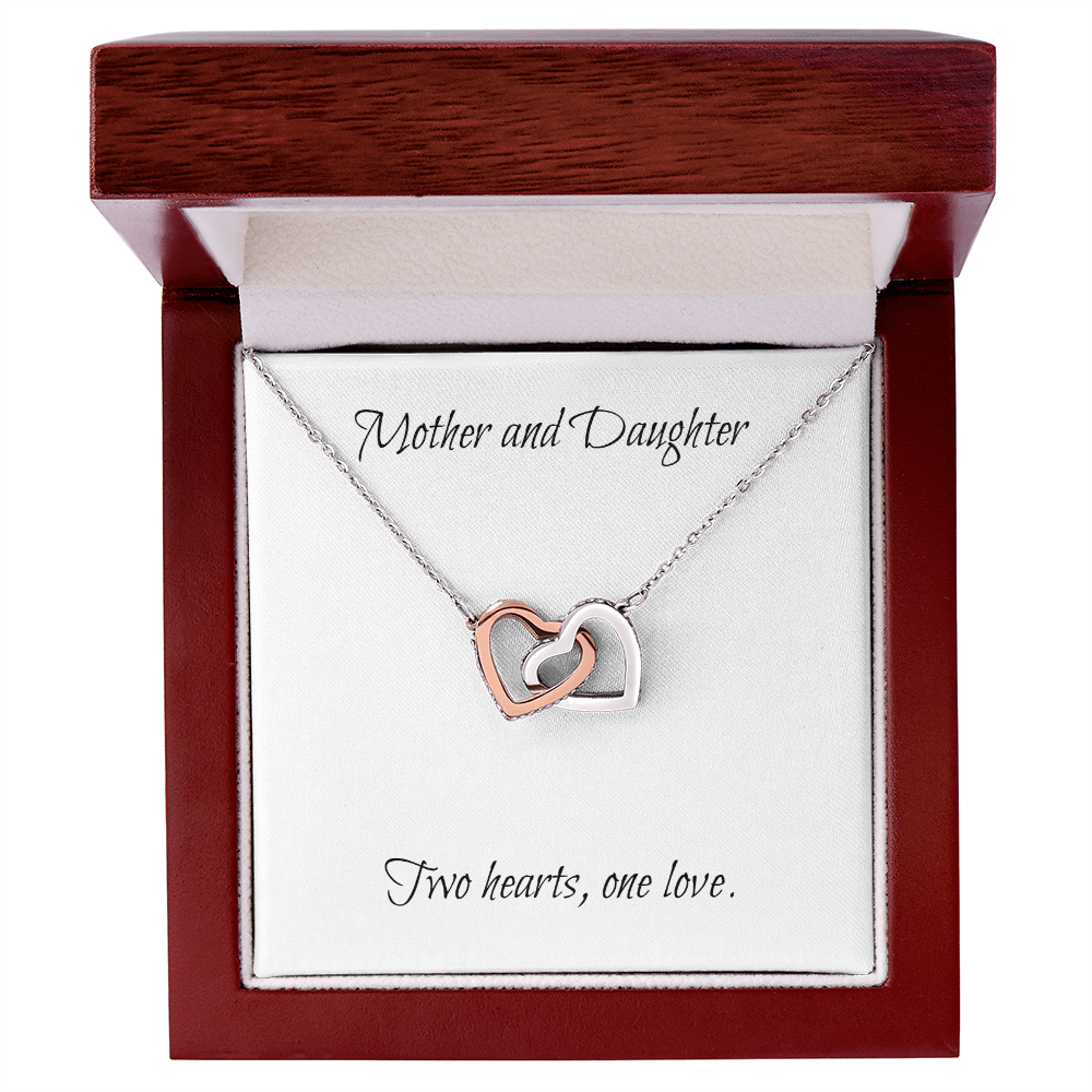 Mother and Daughter connecting hearts necklace.